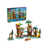 Colorful LEGO® Friends Adventure Camp Tree House set featuring five mini-dolls, vibrant trees, a zip line, and a playful landscape with a boat.
